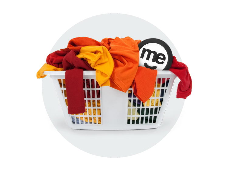 Laundry basket overflowing with colourful clothing beside the ME Bank logo