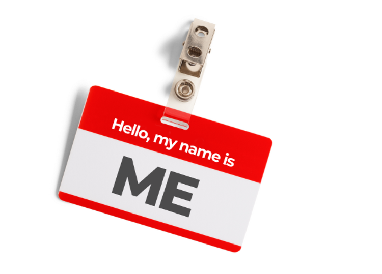 Name badge displaying “Hello, my name is ME” attached to a clip
