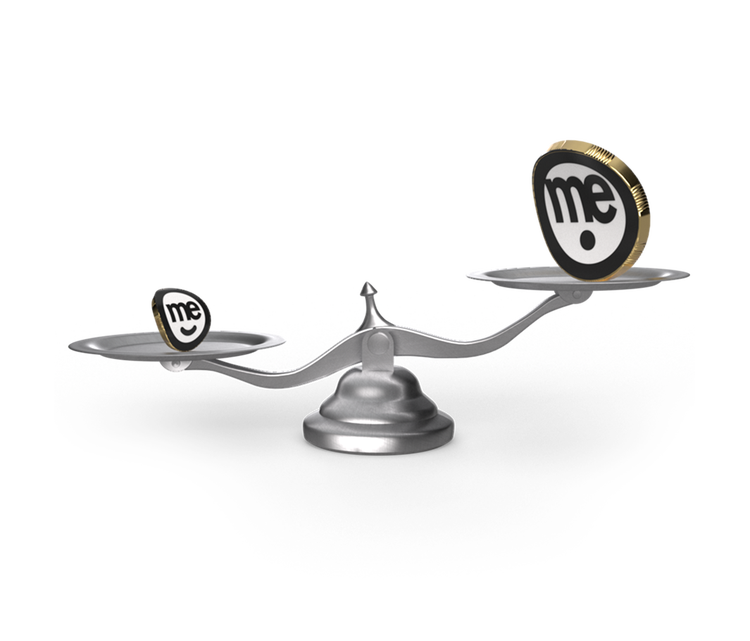 Balance scale with ME branded tokens