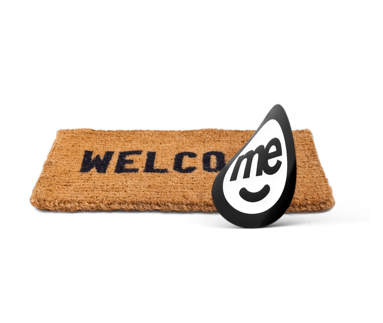 Welcome doormat beside ME logo