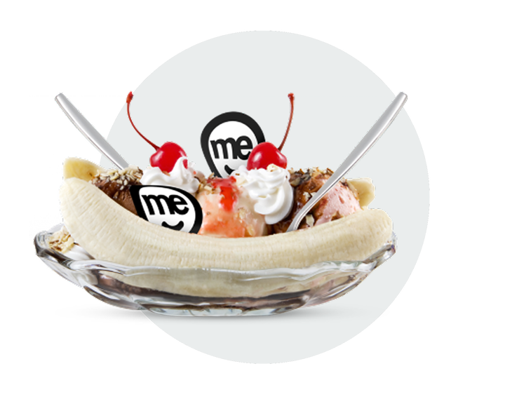 Banana split dessert featuring ME Go branded decorations and ice cream toppings