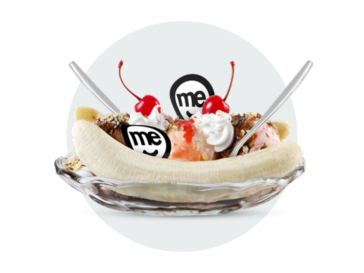 Banana split with ice cream, cherries and ME Go branded decorations