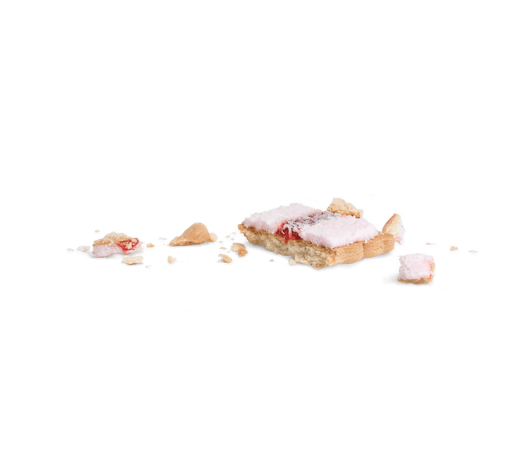 Crumbled jam-filled biscuit scattered in pieces