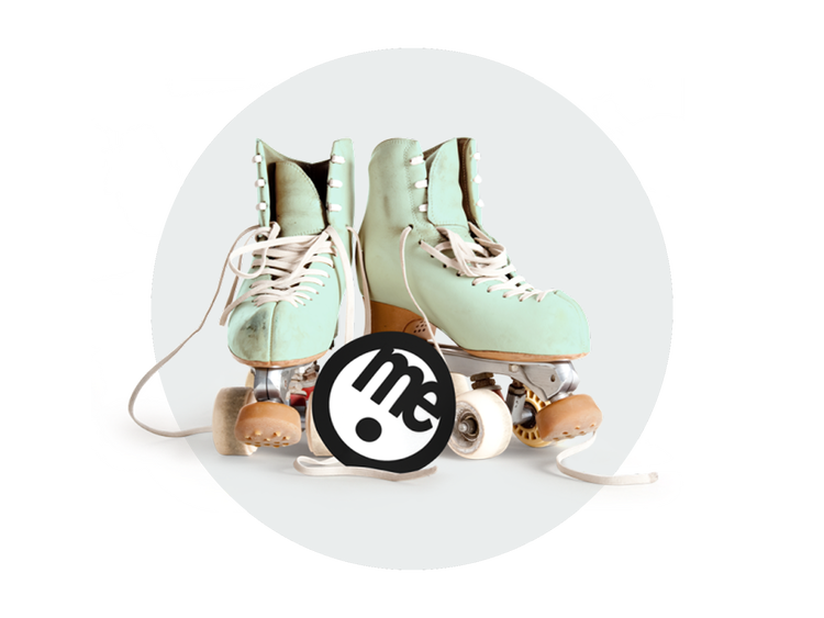 Pair of mint-green roller skates beside a ME Bank logo